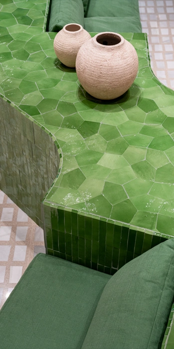 Green Zellige tile sitting area in a commercial space